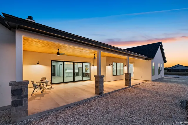 a view of a yard with an ocean view