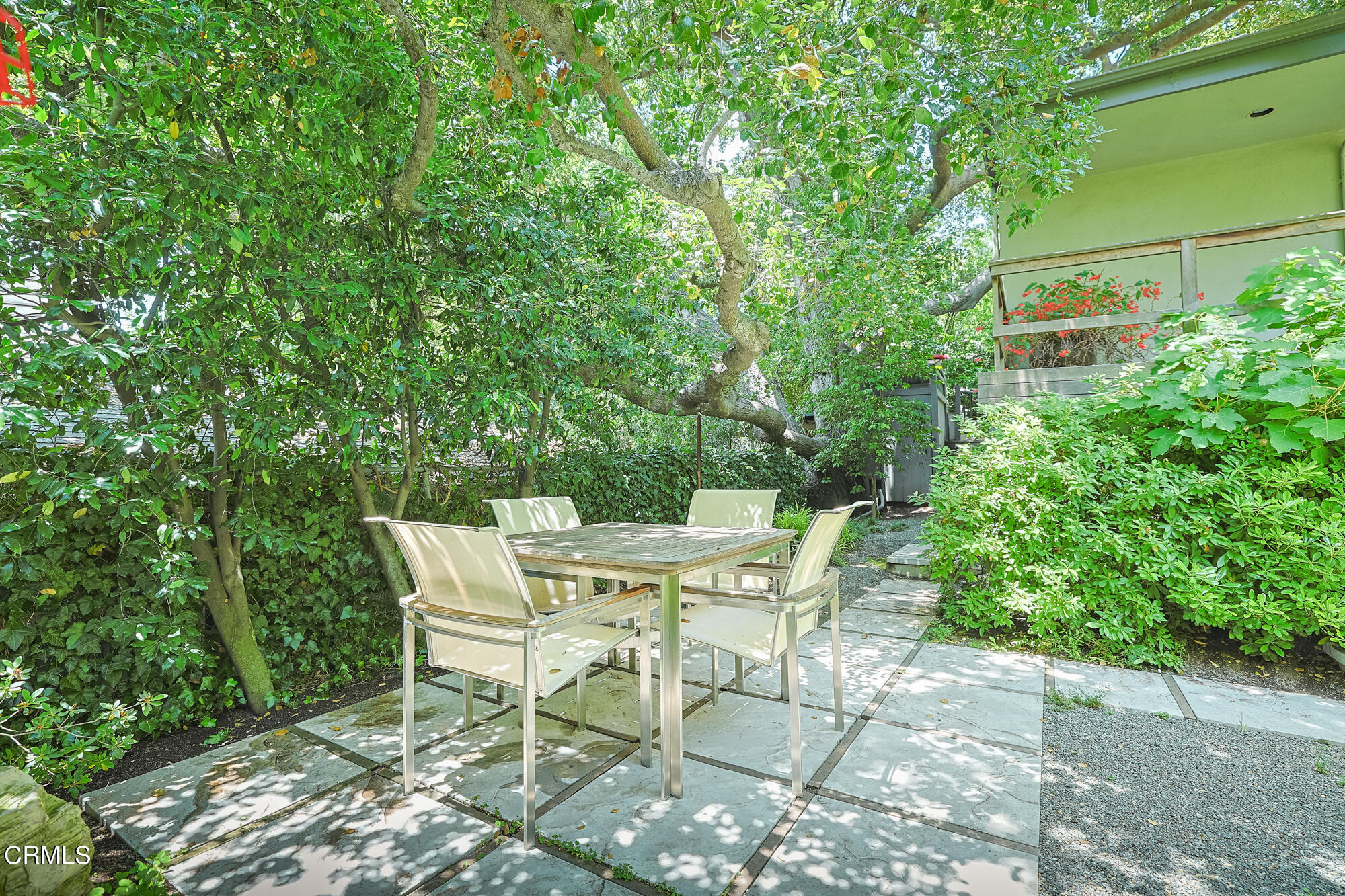 603 Arbor Street Pasadena, CA 91105 - Photo 19 of 26 a patio with table and chairs and potted plants