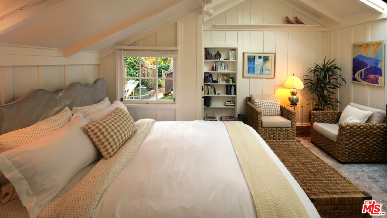 3 Monte Verde Street Carmel-by-the-Sea, CA 93923 - Photo 2 of 13 a bedroom with bed and window