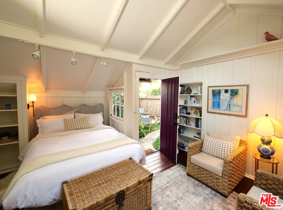 3 Monte Verde Street Carmel-by-the-Sea, CA 93923 - Photo 5 of 13 a bedroom with a bed and furniture