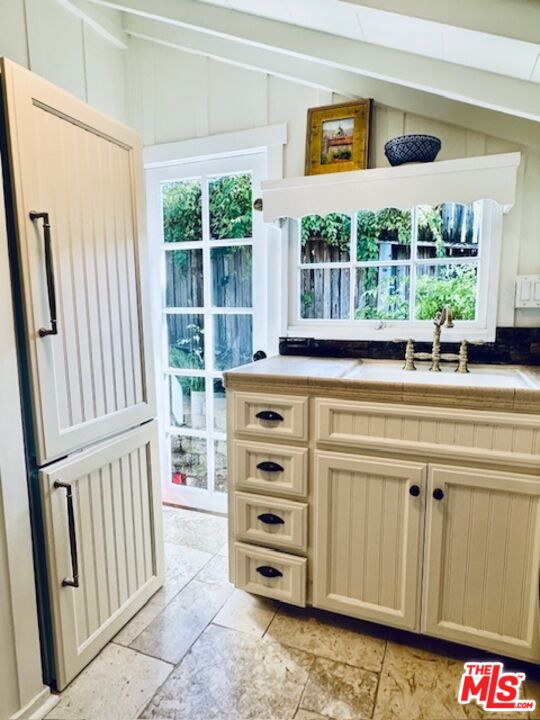3 Monte Verde Street Carmel-by-the-Sea, CA 93923 - Photo 9 of 13 a view of a kitchen with a dishwasher and a large window