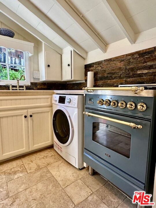 3 Monte Verde Street Carmel-by-the-Sea, CA 93923 - Photo 10 of 13 a utility room with dryer and washer