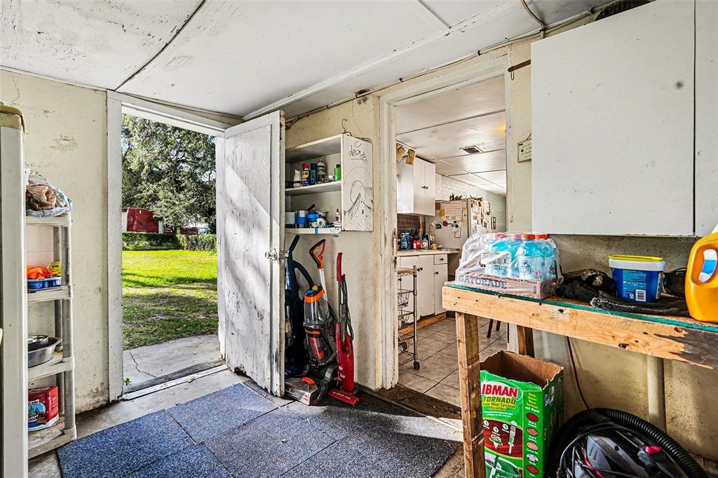 2518 Elm Street Seffner, FL 33584 - Photo 16 of 27 a view of a storage & utility room with stuff