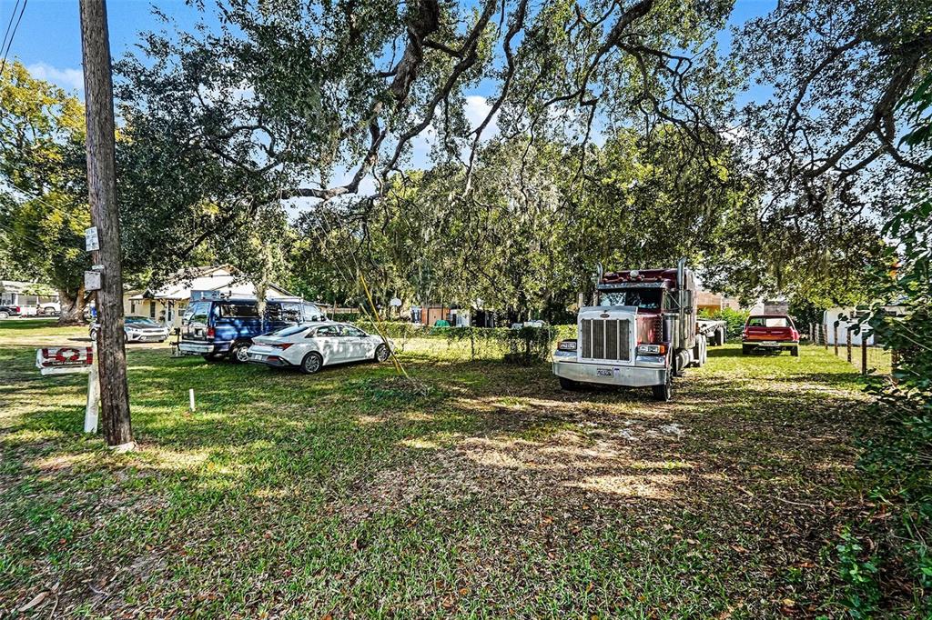 2518 Elm Street Seffner, FL 33584 - Photo 18 of 27 a view of a garden with car parked