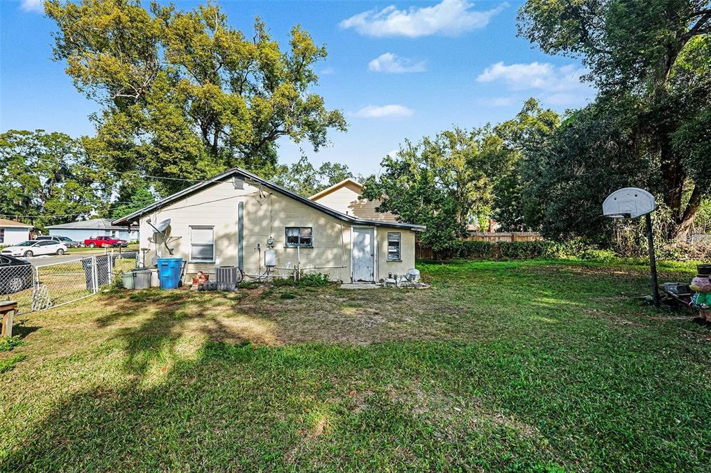 2518 Elm Street Seffner, FL 33584 - Photo 23 of 27 a view of a house with a yard and trees
