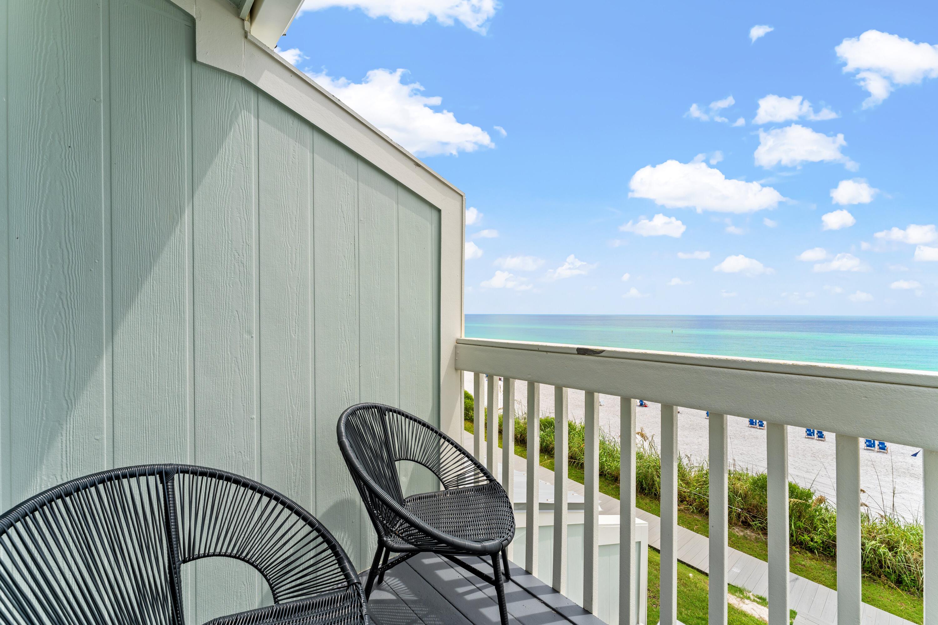 128 Blue Mountain Road, Unit 3 Santa Rosa Beach, FL 32459 - Photo 23 of 33 a view of a balcony with furniture