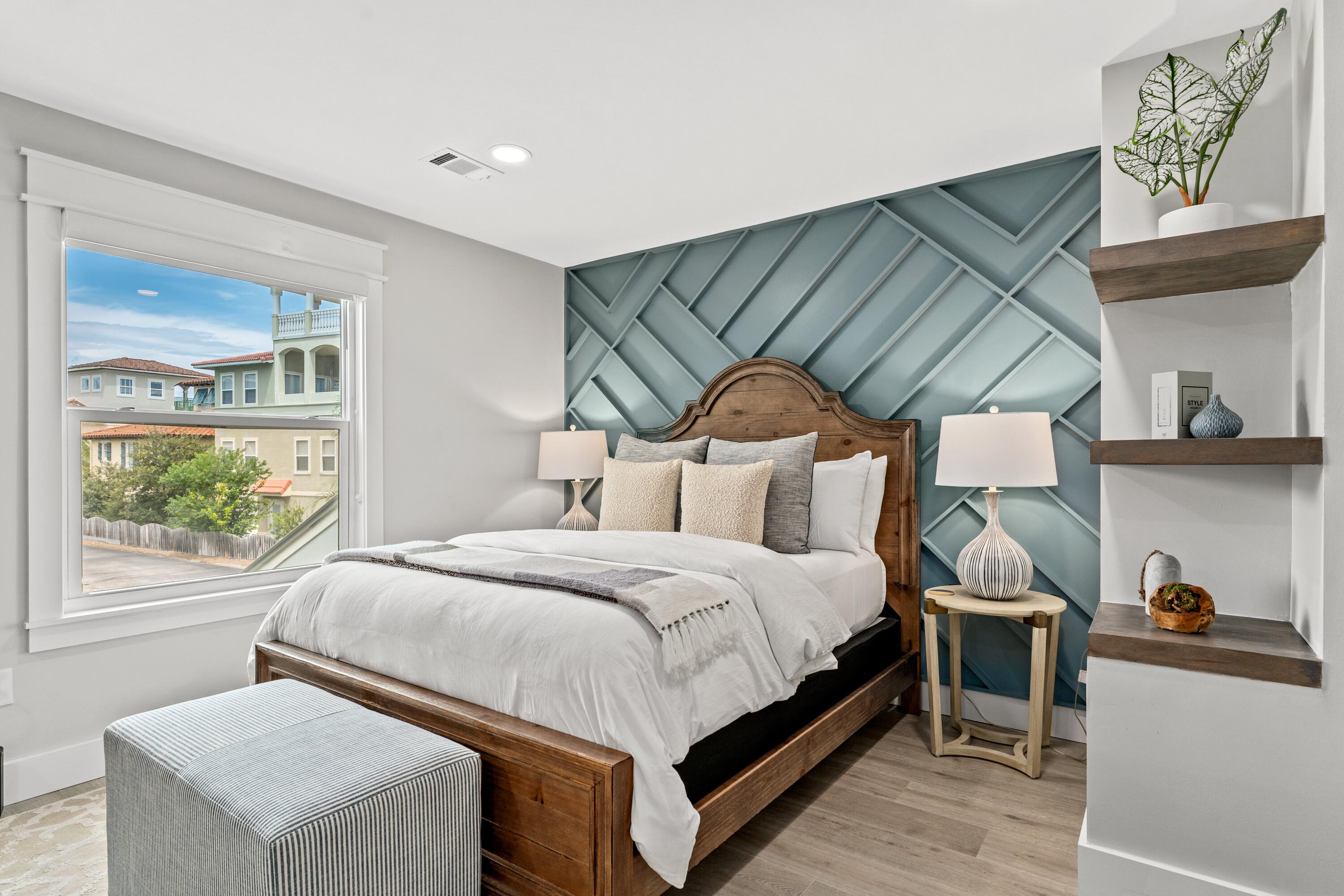 128 Blue Mountain Road, Unit 3 Santa Rosa Beach, FL 32459 - Photo 28 of 33 a bedroom with a bed and a window