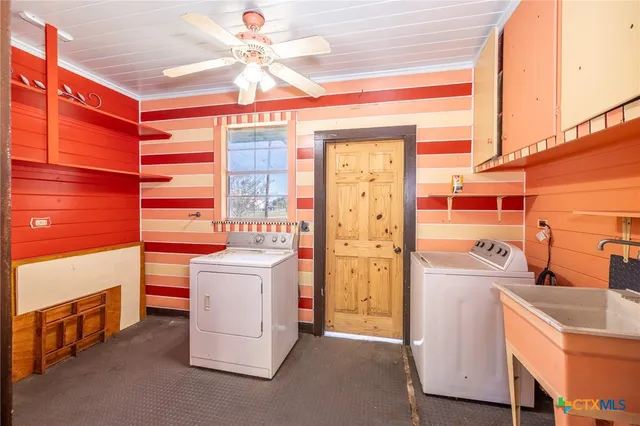 a kitchen with a stove and a refrigerator