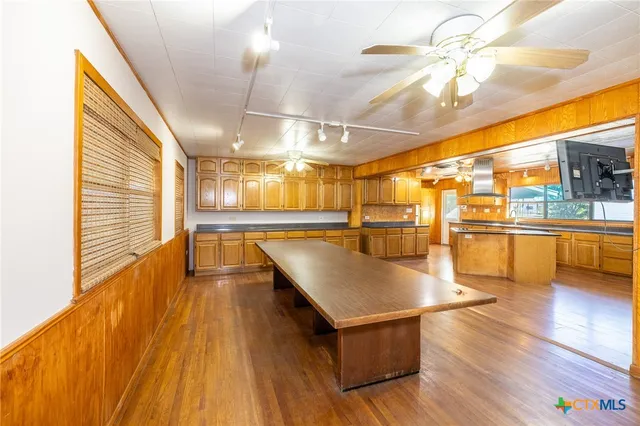 a large room with wooden floor