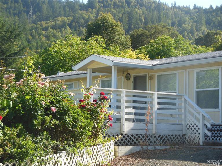 8321 Franz Valley Road Calistoga, CA 94515 - Photo 1 of 1 a front view of a house with a garden