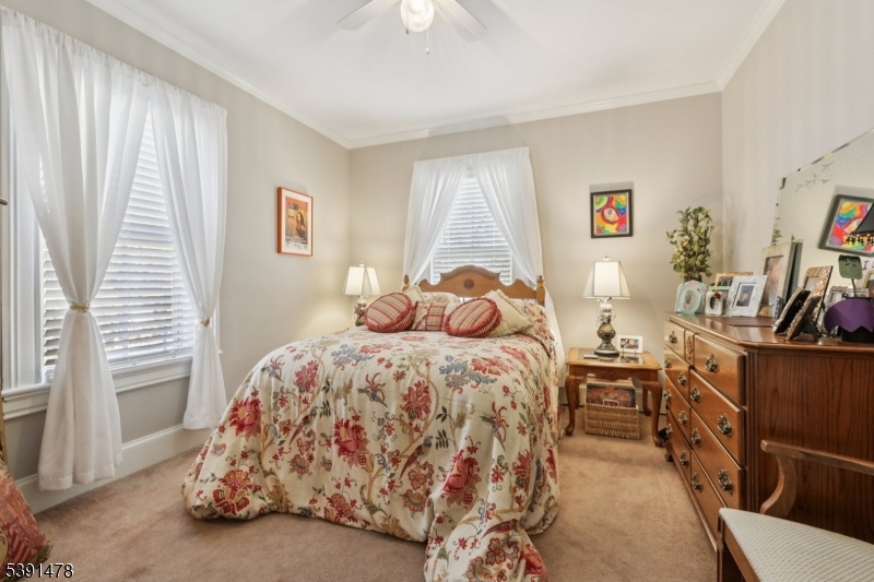 1035 Littleton Road Parsippany, NJ 07054 - Photo 35 of 47 a bedroom with a bed and a window