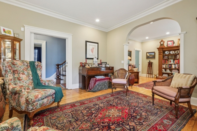 1035 Littleton Road Parsippany, NJ 07054 - Photo 8 of 47 a living room with furniture and wooden floor