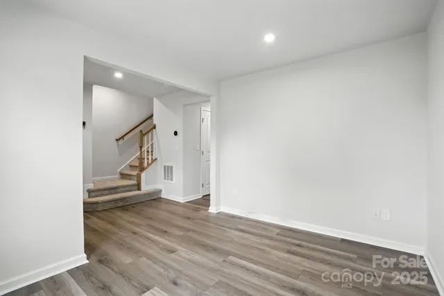 a view of an empty room and window