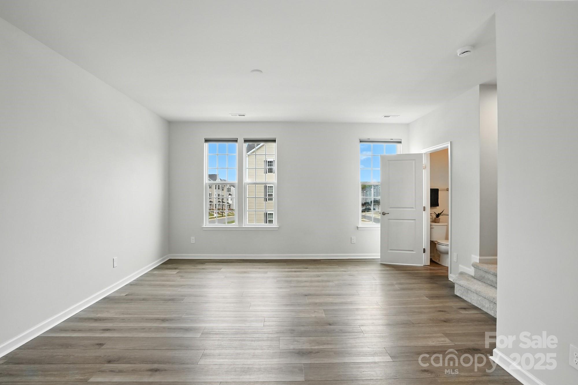 2108 Trout Lily Lane, Unit 198 Matthews, NC 28104 - Photo 26 of 45 a view of livingroom with hardwood