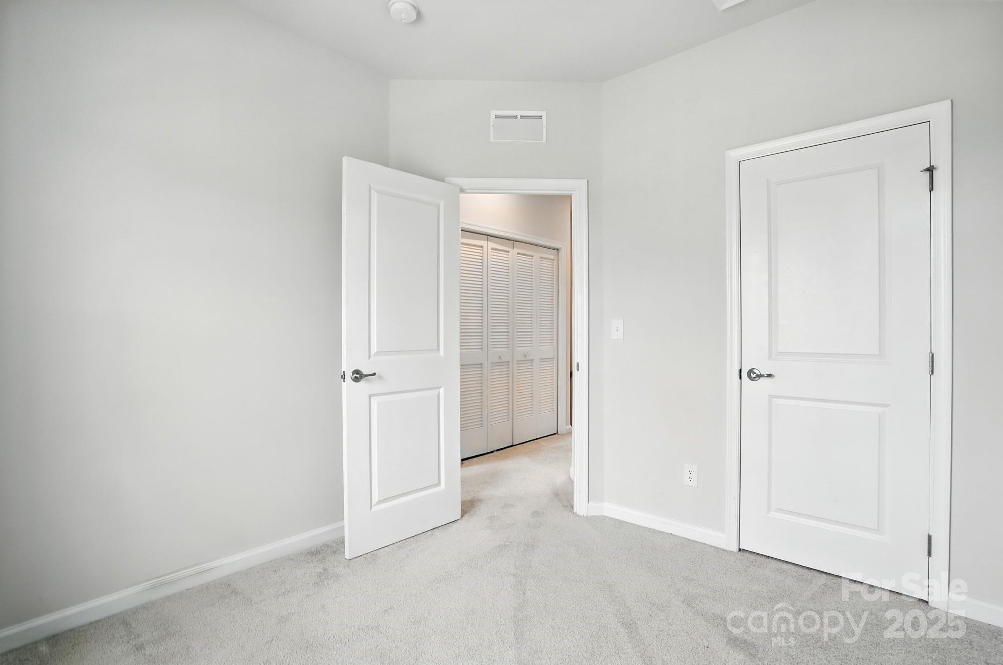 2108 Trout Lily Lane, Unit 198 Matthews, NC 28104 - Photo 35 of 45 a view of an empty room
