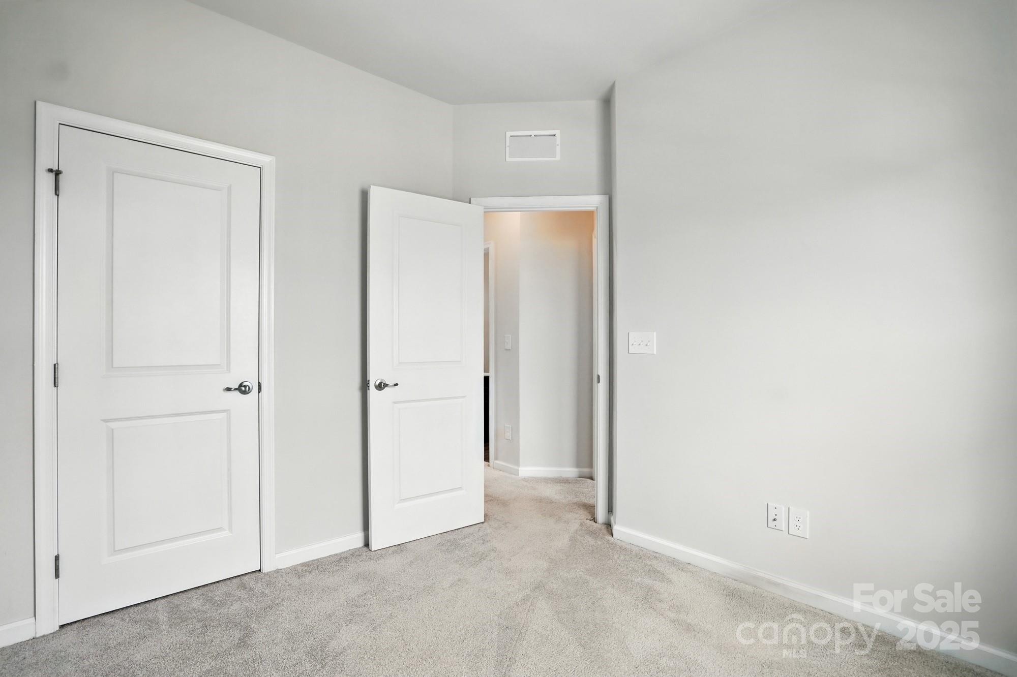 2108 Trout Lily Lane, Unit 198 Matthews, NC 28104 - Photo 38 of 45 a view of an empty room