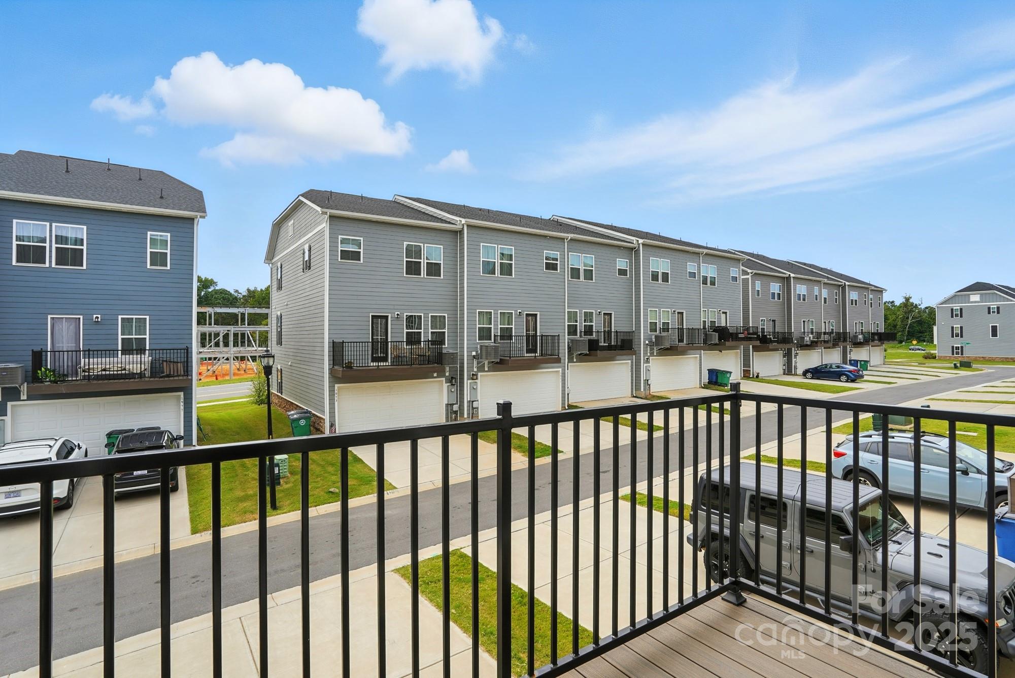 2108 Trout Lily Lane, Unit 198 Matthews, NC 28104 - Photo 40 of 45 a view of city from a balcony
