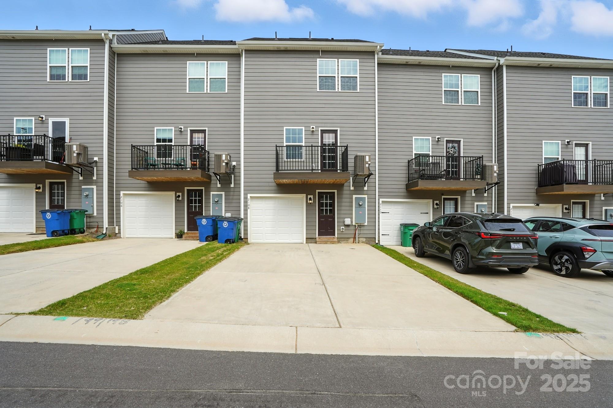2108 Trout Lily Lane, Unit 198 Matthews, NC 28104 - Photo 42 of 45 a house view with a outdoor space