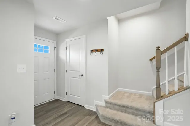 a view of livingroom with furniture and wooden floor