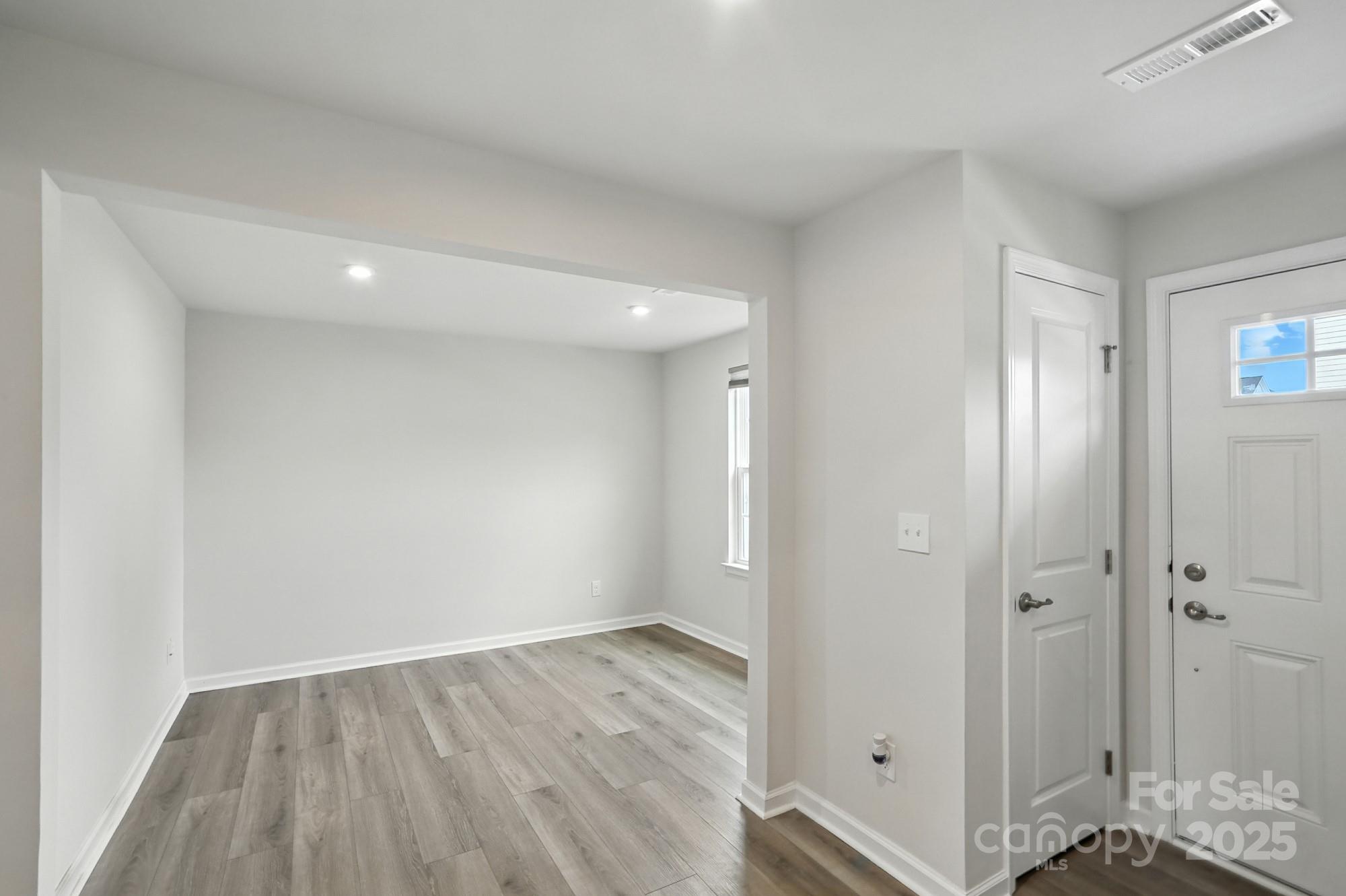 2108 Trout Lily Lane, Unit 198 Matthews, NC 28104 - Photo 7 of 45 wooden floor in an empty room