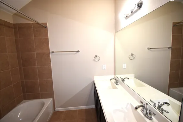 a bathroom with a sink and a bathtub