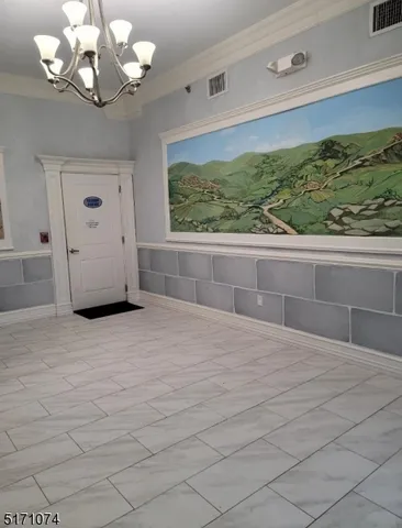 a view of a livingroom with a chandelier