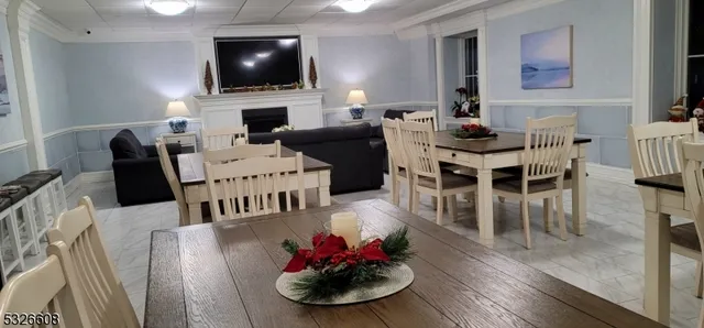 a kitchen with kitchen island a sink stove and wooden cabinets