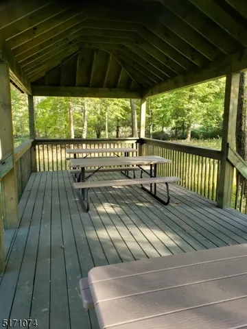 a view of a balcony with furniture