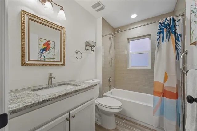 a view of a backyard patio and swimming pool