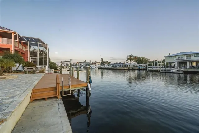 an aerial view of a city with ocean view