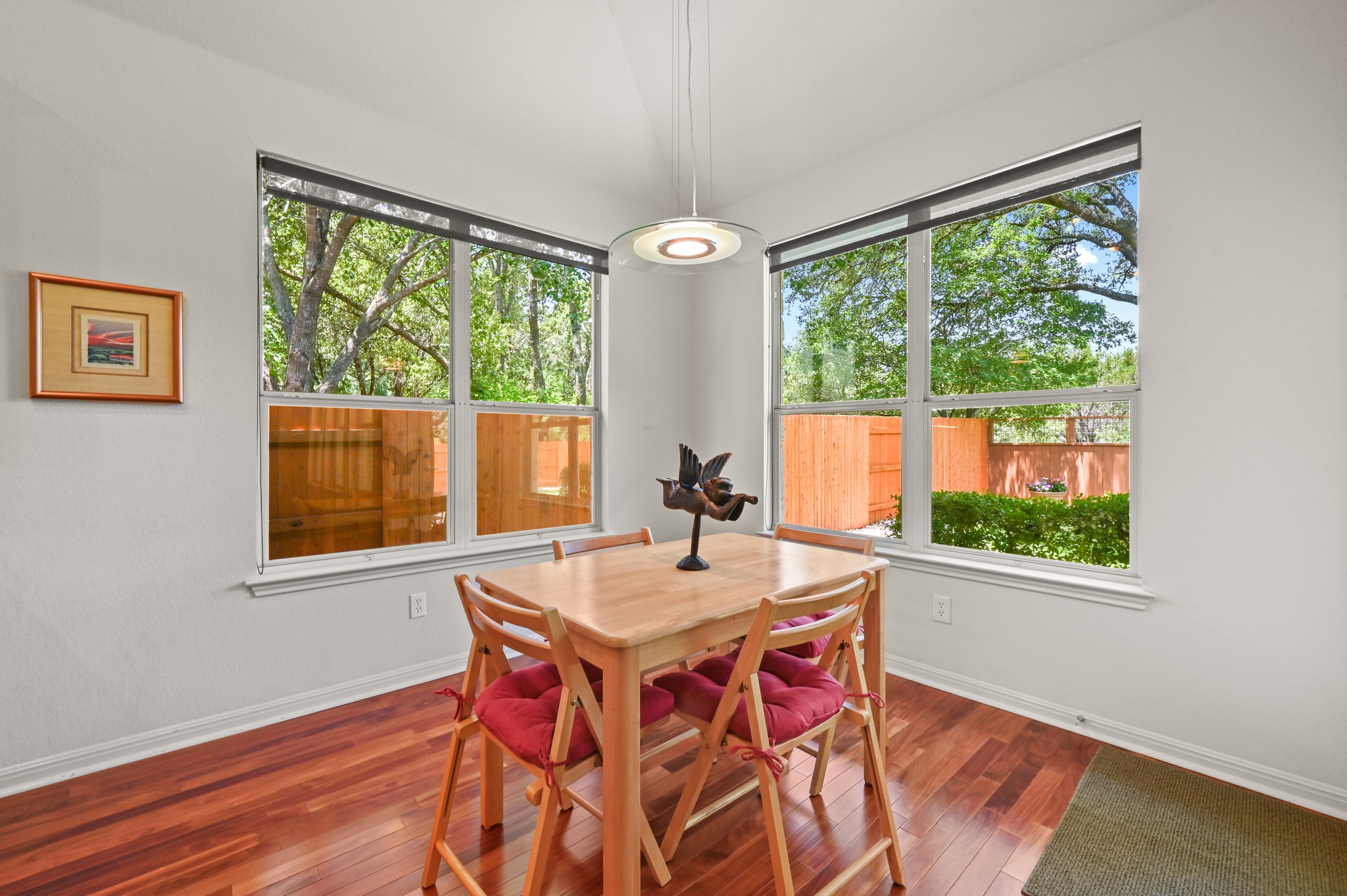 7301 Seneca Falls Loop Austin, TX 78739 - Photo 12 of 36 This breakfast area would be a great place to start the day and take in the view from the large picture windows.