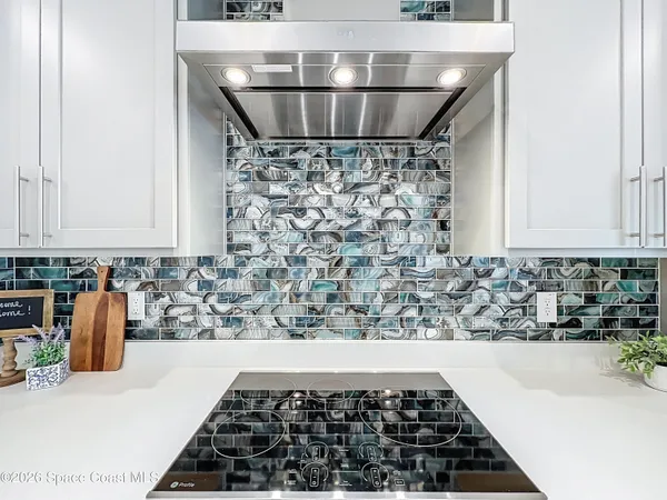 a bathroom with a sink and a stove