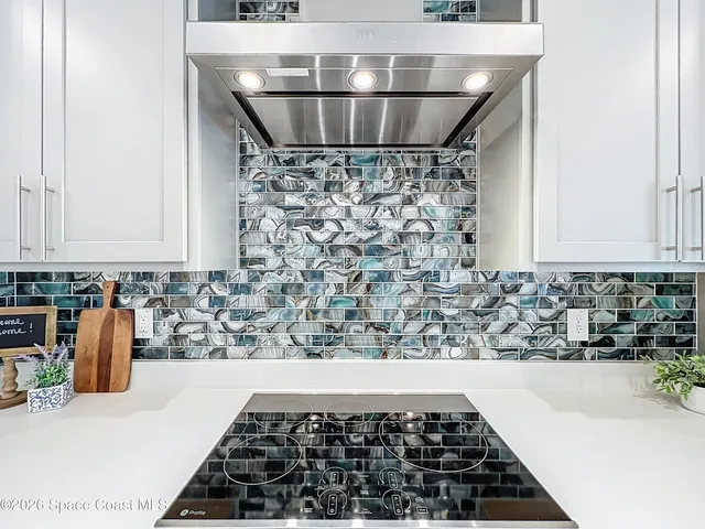 a bathroom with a sink and a stove