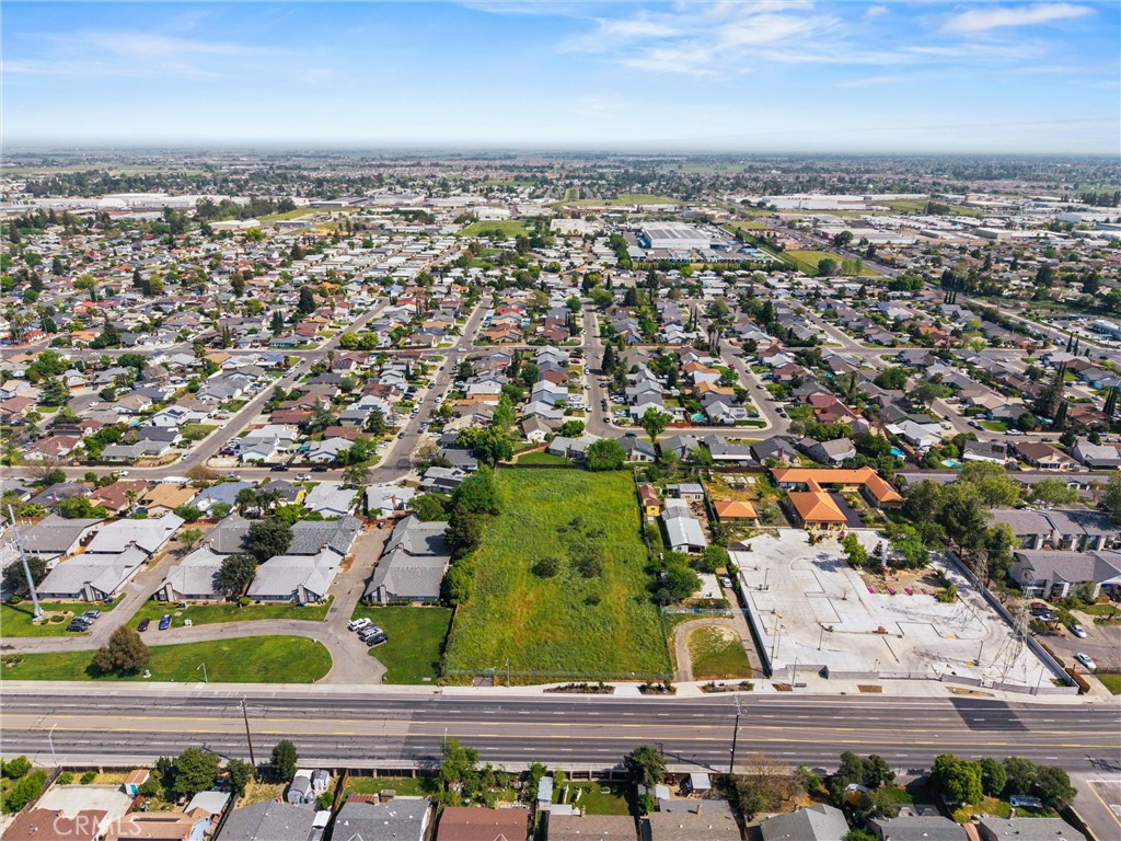 7525 Power Inn Road Sacramento, CA 95828 - Photo 3 of 27 an aerial view of residential houses with outdoor space