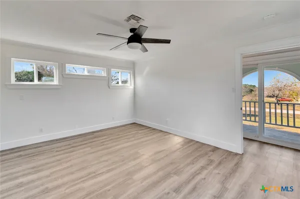 a bathroom with a sink a mirror and a toilet