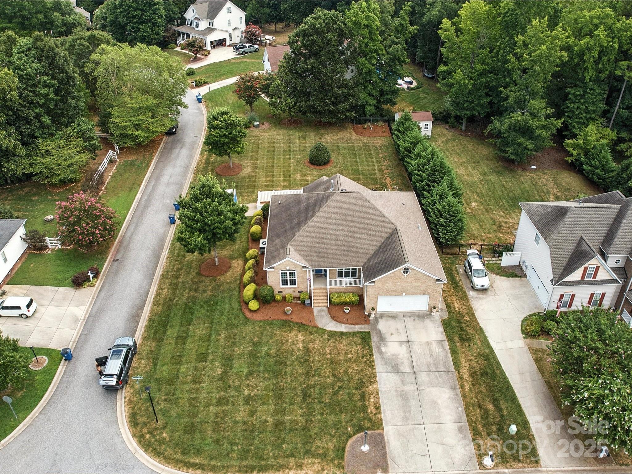 11761 Crossroads Place Concord, NC 28025 - Photo 32 of 32 an aerial view of a house with outdoor space and lake view