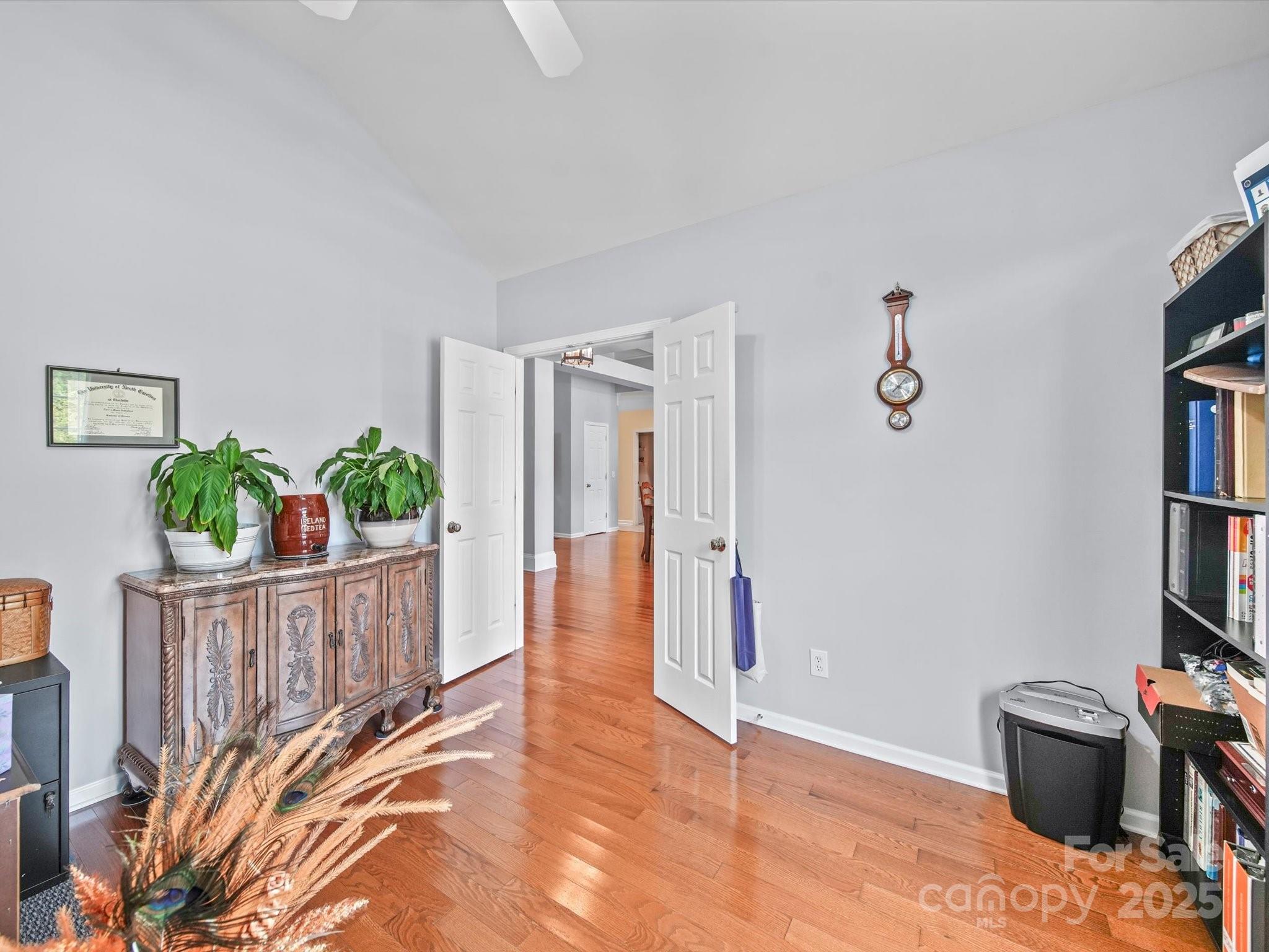 11761 Crossroads Place Concord, NC 28025 - Photo 8 of 32 a view of an entryway with wooden floor
