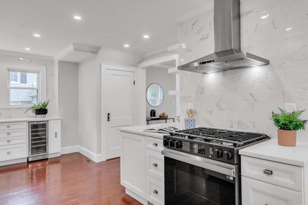 56 Pine Hill Road Dedham, MA 02026 - Photo 11 of 32 a white stove top oven sitting inside of a kitchen