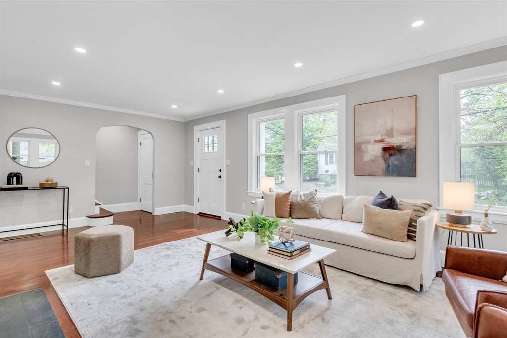 56 Pine Hill Road Dedham, MA 02026 - Photo 5 of 32 a living room with furniture and a large window