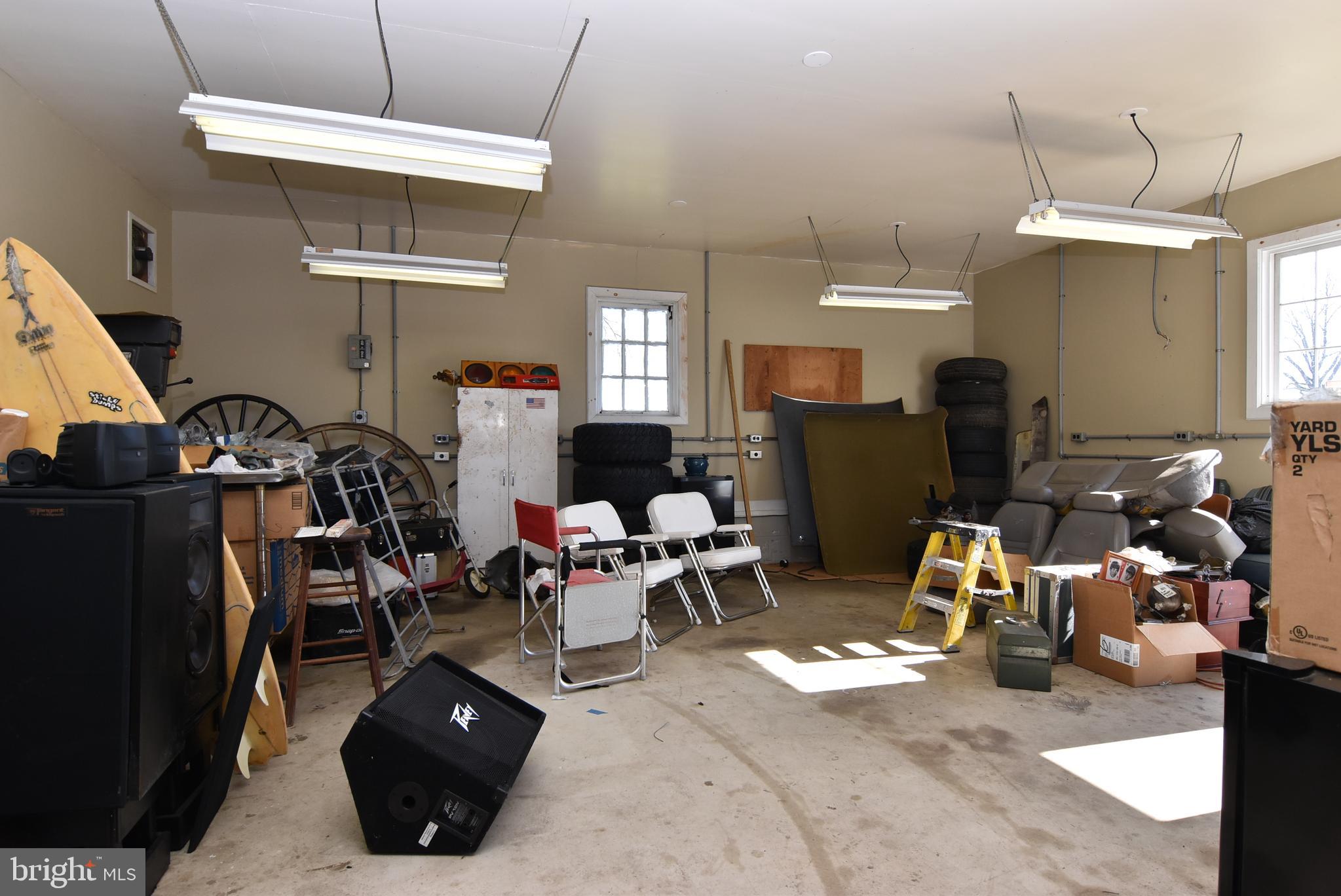 28828 Boyce Road Laurel, DE 19956 - Photo 12 of 16 a room with lots of white furniture and a window