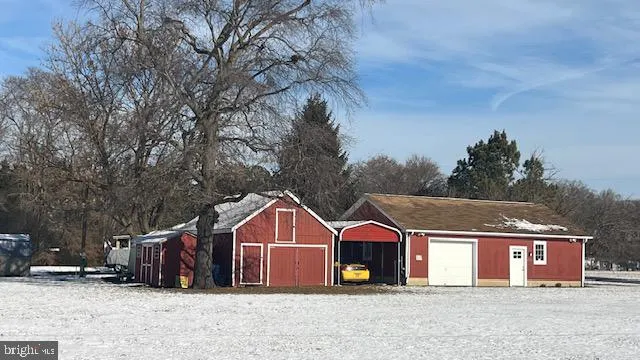 a house with trees in front of it