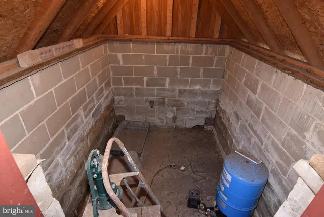 a view of swimming pool with an outdoor seating