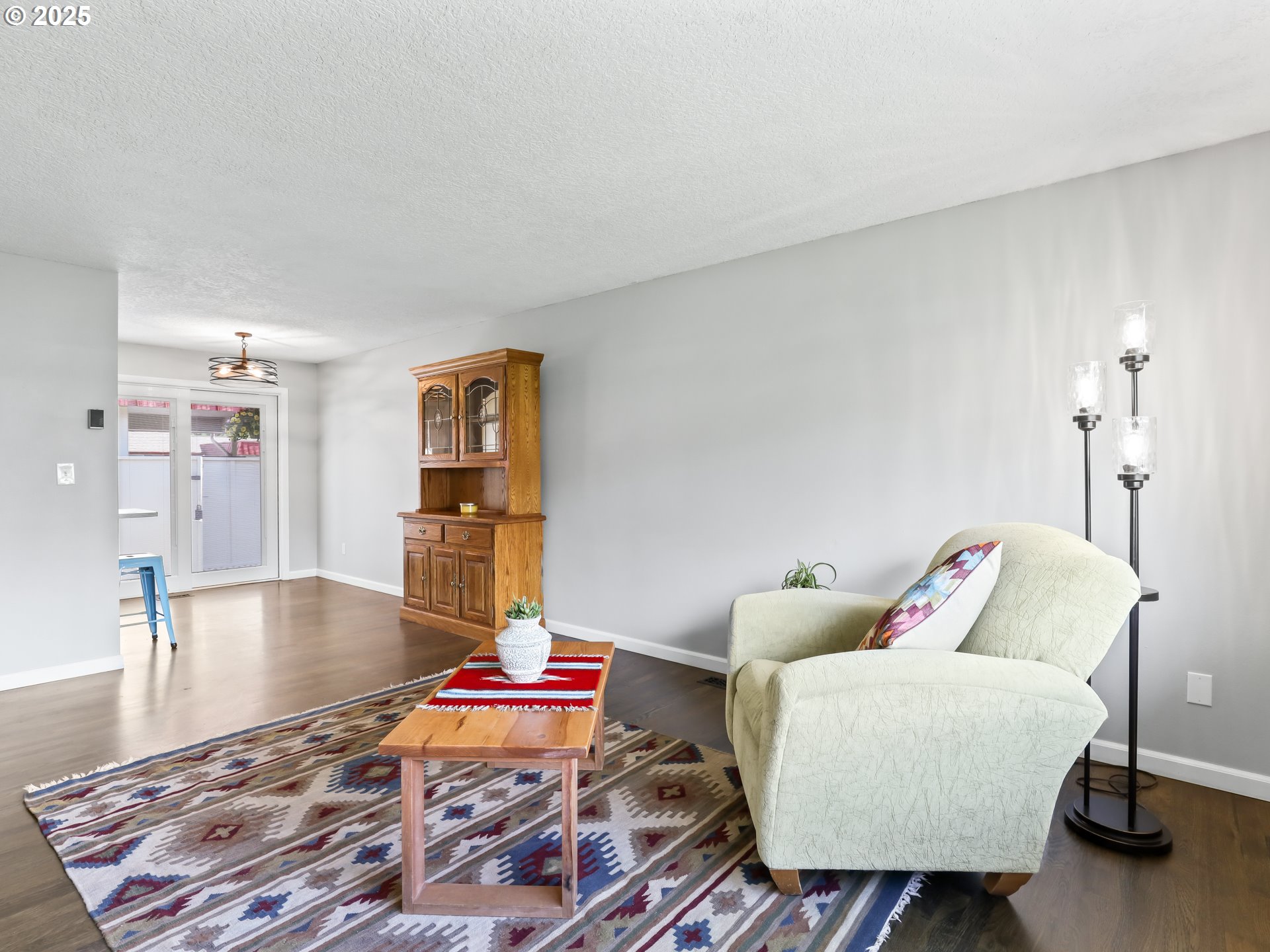 14967 Southeast Grant Court Portland, OR 97233 - Photo 3 of 46 a living room with furniture and a table