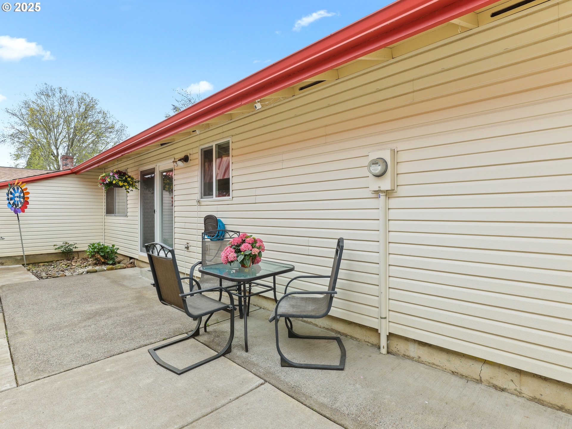 14967 Southeast Grant Court Portland, OR 97233 - Photo 31 of 46 a view of a chairs and table in a back yard of the house