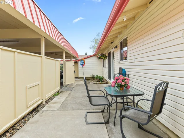 a backyard of a house with lots of green space