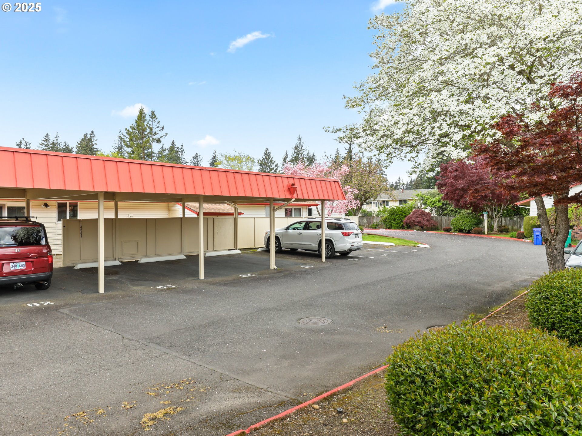 14967 Southeast Grant Court Portland, OR 97233 - Photo 33 of 46 a view of a cars park in front of a building
