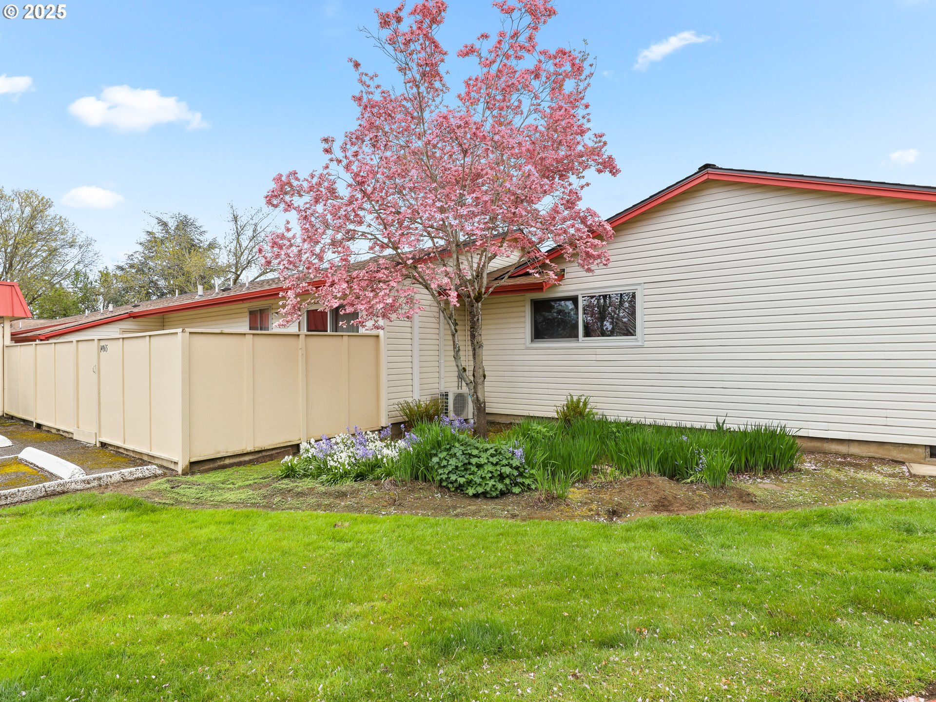 14967 Southeast Grant Court Portland, OR 97233 - Photo 35 of 46 a backyard of a house with lots of green space
