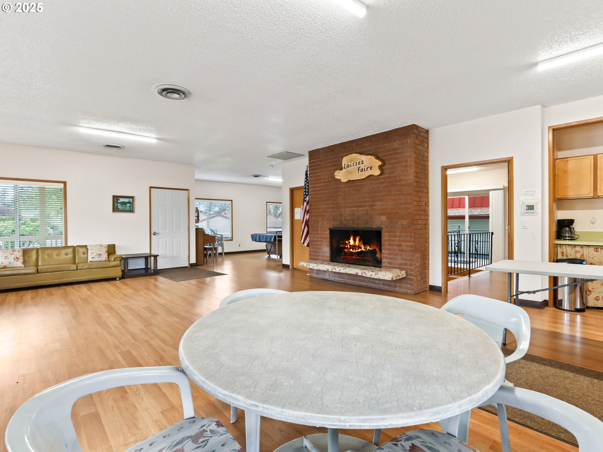 14967 Southeast Grant Court Portland, OR 97233 - Photo 38 of 46 a living room with furniture and a fireplace