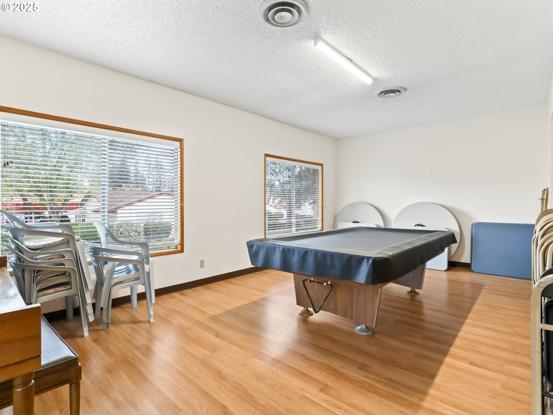 14967 Southeast Grant Court Portland, OR 97233 - Photo 40 of 46 a view of a livingroom with furniture window and wooden floor
