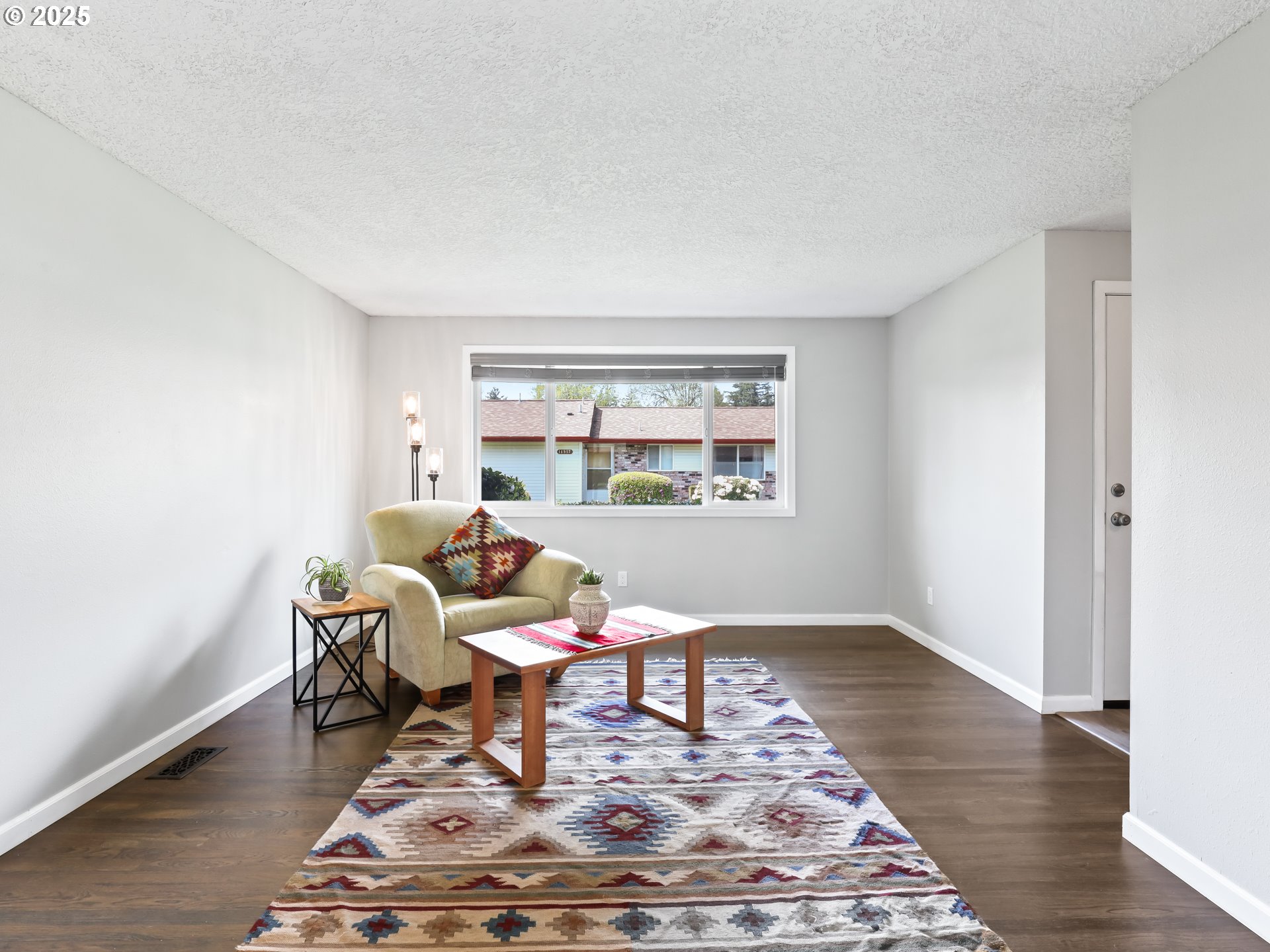 14967 Southeast Grant Court Portland, OR 97233 - Photo 5 of 46 a living room with a rug